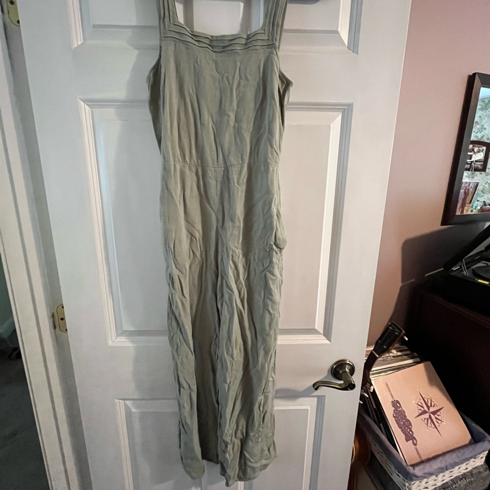 Green jumpsuit with pockets